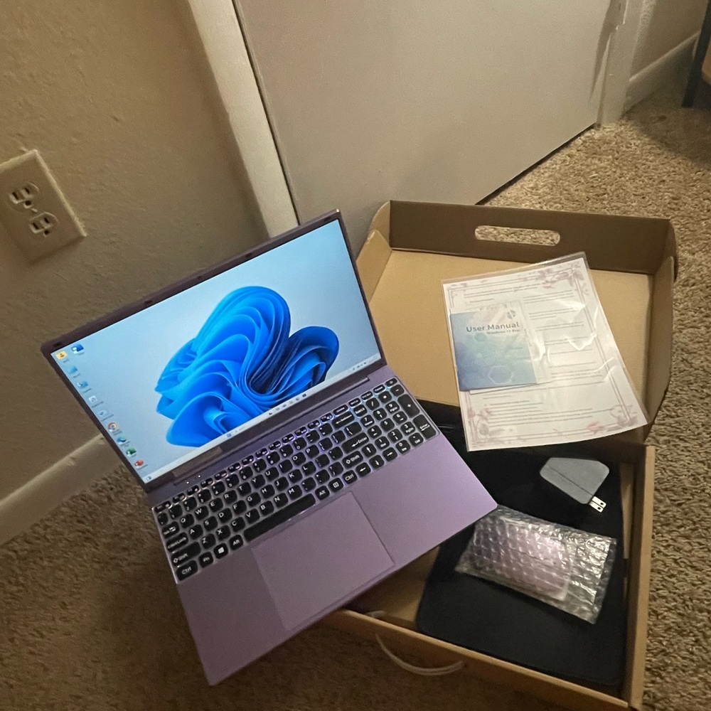 Purple Laptop with Accessories